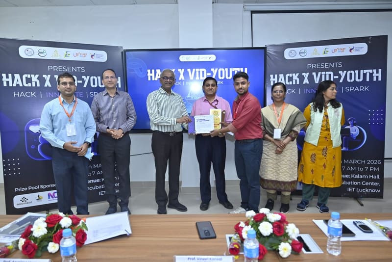 Innovgeist receiving a certificate of appreciation alongside faculty at HACK X VID-YOUTH, IET Lucknow.